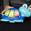 BABY EINSTEIN Skákadlo/Aktivní centrum 2v1 Curiosity Cove™ 6m+ do 11kg