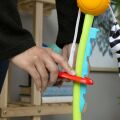 BABY EINSTEIN Skákadlo/Aktivní centrum 2v1 Curiosity Cove™ 6m+ do 11kg