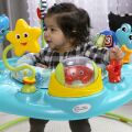BABY EINSTEIN Skákadlo/Aktivní centrum 2v1 Curiosity Cove™ 6m+ do 11kg