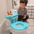BABY EINSTEIN Toaleta dětská se zvukem 2v1 Geared for Success™ 18m+